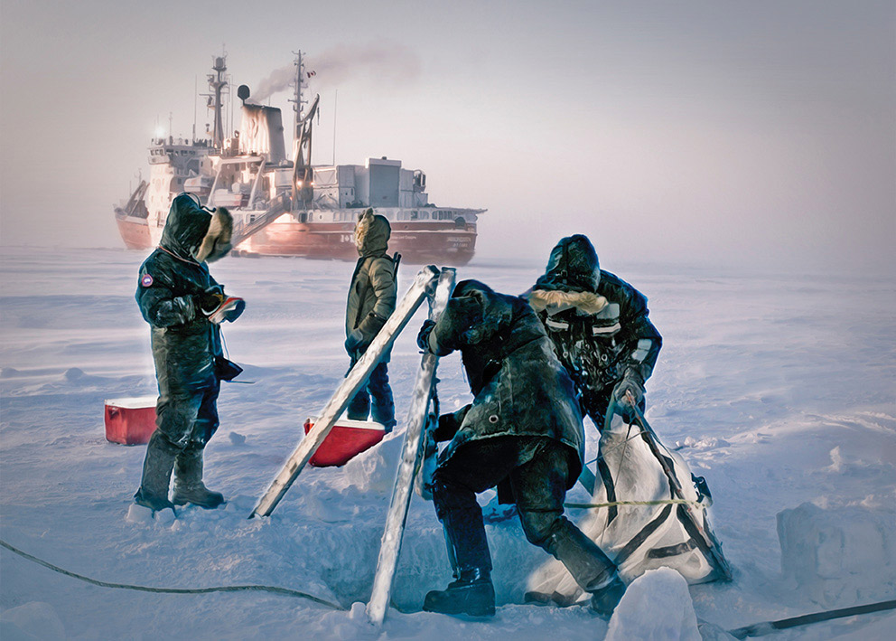 Researchers setting nets for arctic cod under the ice of the Beaufort Sea.