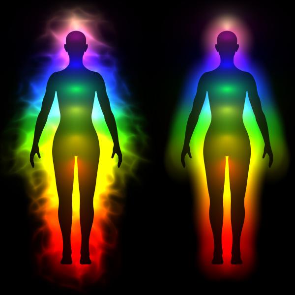 A rainbow of light emanates from two human forms side by side