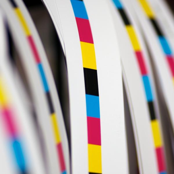 Paper strips printed with CMYK colours