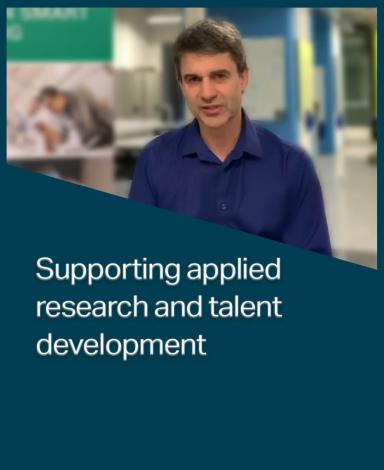 An image card featuring Professor Eric Renaud inside a dark blue rectangle with the statement "Supporting applied  research and talent development" in white text overlayed over it.