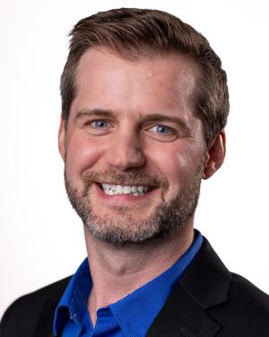 Headshot of Simon Coulson