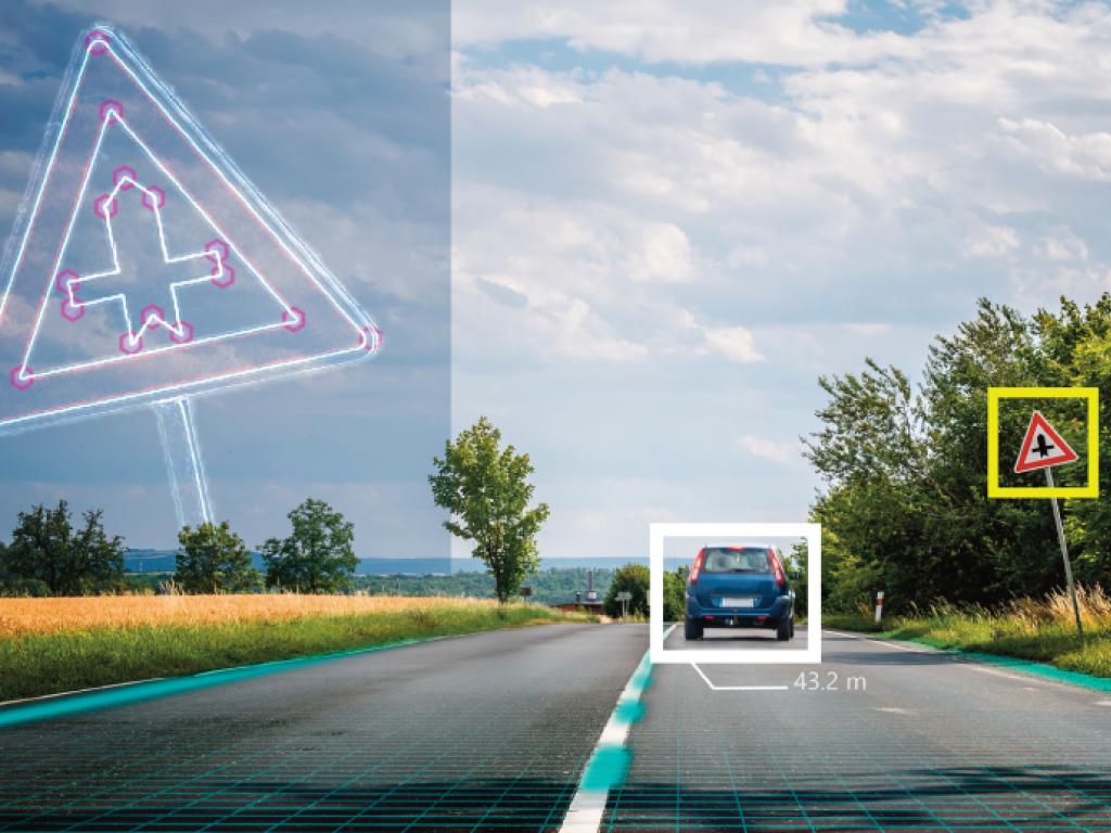 A two-lane highway viewed from a windshield with a car ahead and several digital markers overlain on the image