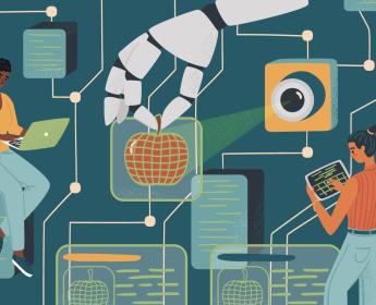 An illustration of a robot hand holding an apple, which is in a spotlight, by its stem and two people working on screens on a backdrop of electric circuits.