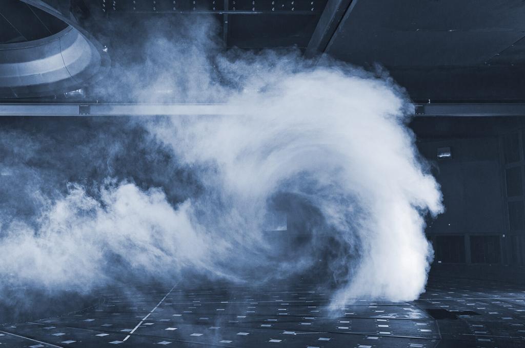 A white swirl of air inside a large enclosure.