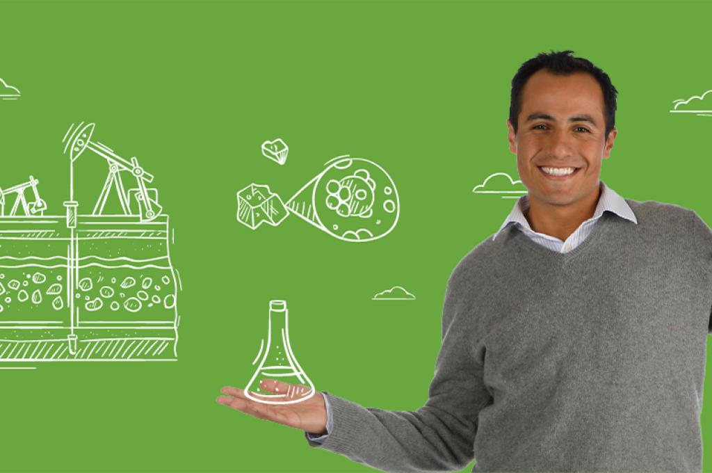 Research associate Luis Alejandro Coy posing for a photo over a green background.