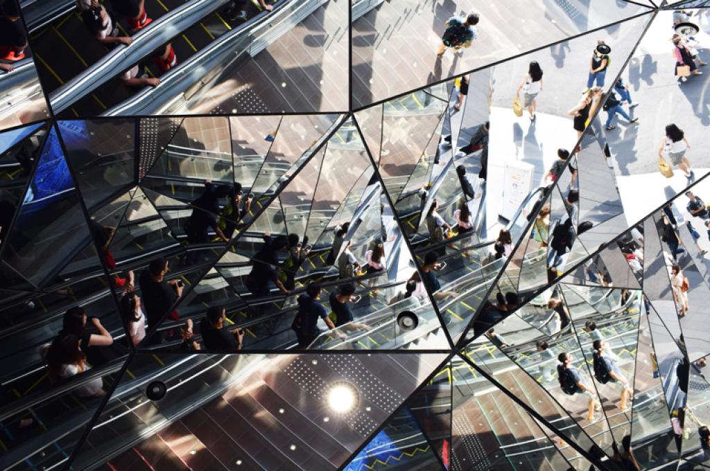 A fractured view of people in a public space